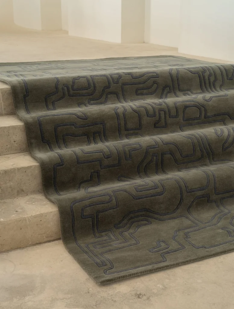 OEO x Massimo strucutre rug with patterns on it, featuring green one
